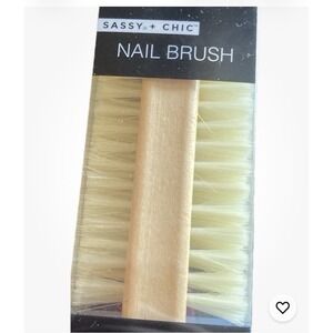 Sassy + Chic wooden nail brush new in package for nail maintenance.